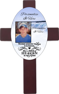 Personalized oval cross with a photo and your own words. Cross has a memorial saying because someone we love is in heaven, there is a little bit of heaven in our home. Cross has a waterfall background.